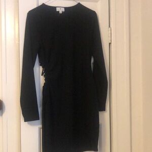 Never worn right stretchy black dress with tie side that is adjustable